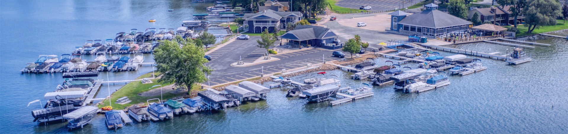 Boats docked at Eagle Point Marina on Clark Lake